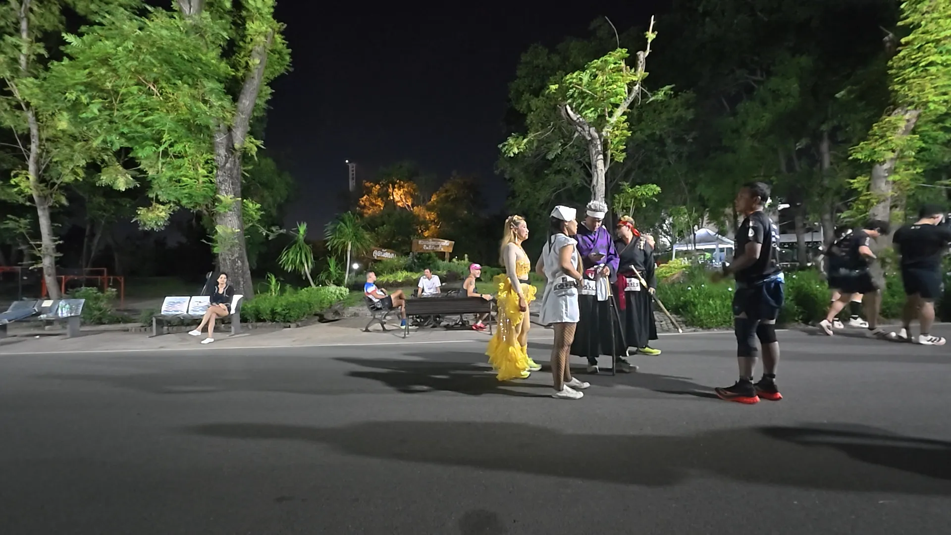 Cosplay cheer squad at Ultra Park Run Thailand 100 with samurai, ninja, Thai dancer and nurse
