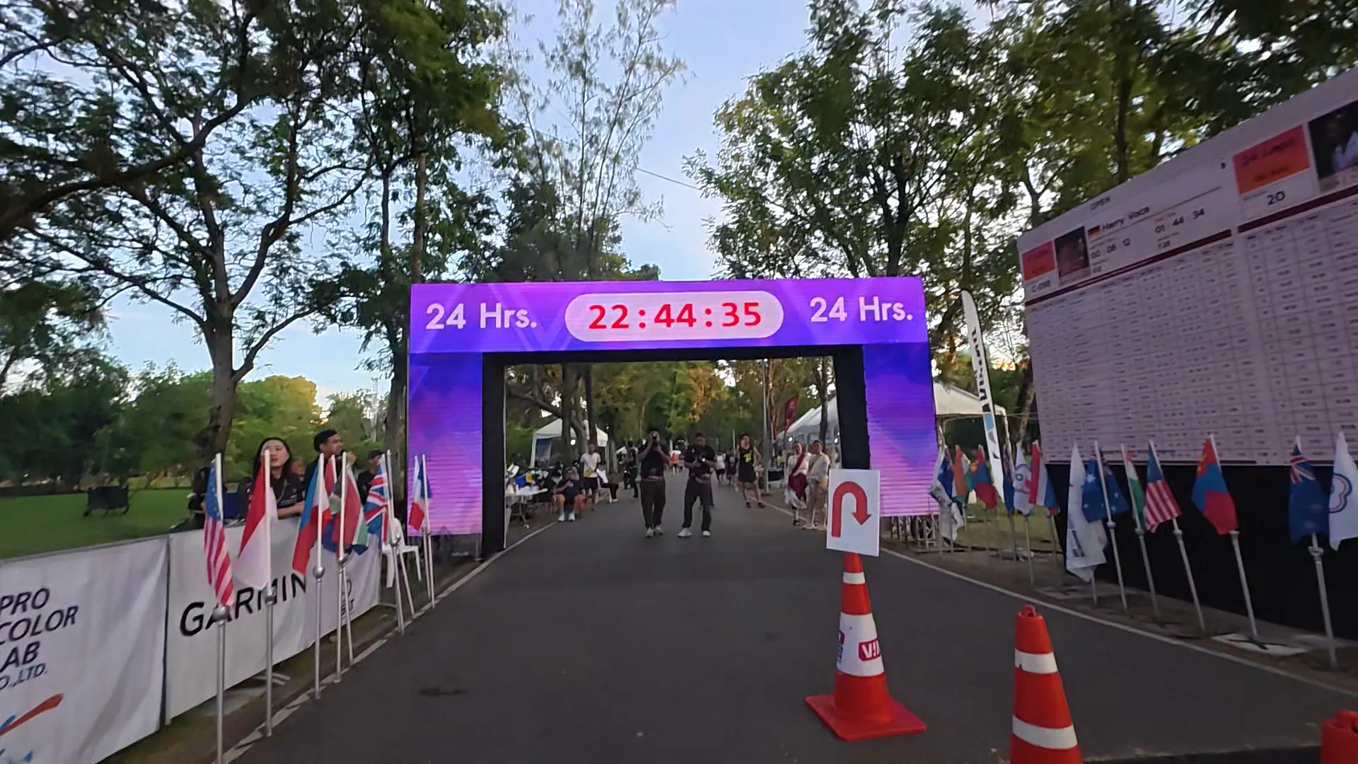 Finish line arch of Ultra Park Run Thailand 100 after sunrise in Wachirabenchatat Park